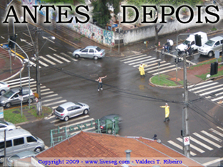 Flagra - Jovem controlando o trnsito voluntariamente em dia de chuva - Solidariedade ou imprudncia?